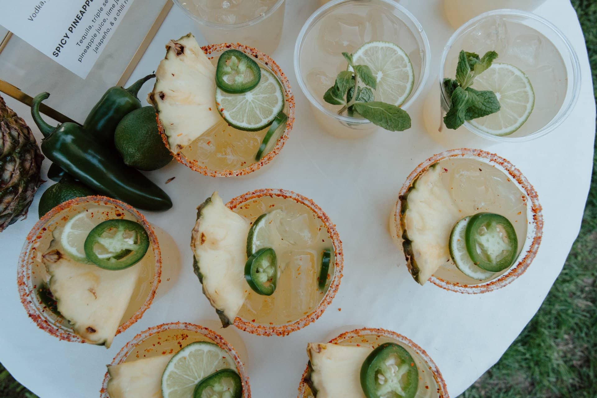 Spicy pineapple margaritas with fresh pineapple, jalapeno and lime for a private party