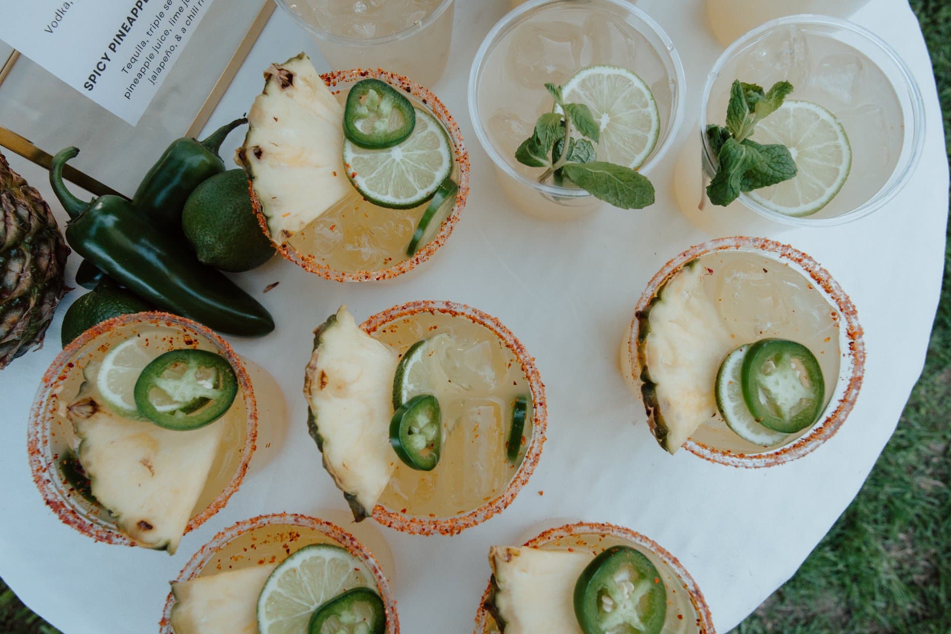 Spicy pineapple margaritas with fresh pineapple, jalapeno and lime for a private party